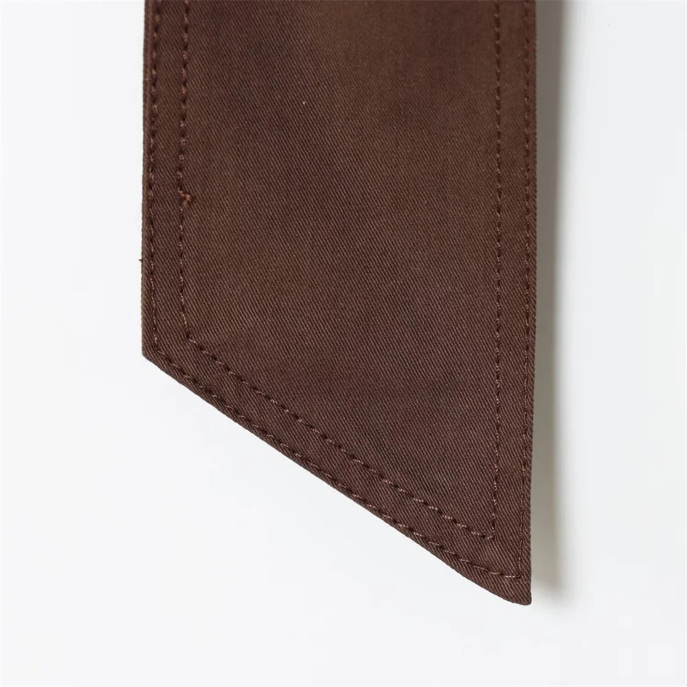 new women's clothing design features a loose and versatile short trench coat with a lapel and waist belt