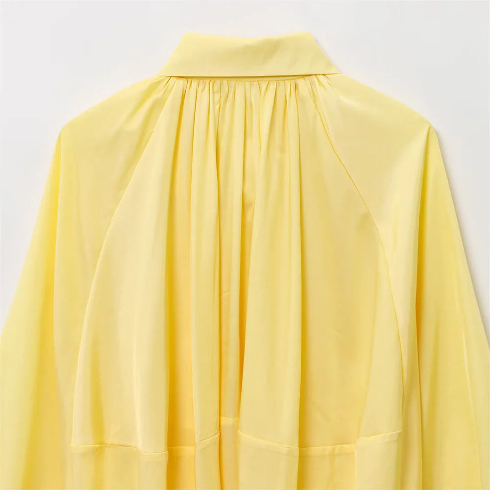 women's jacket is fashionable and simple with a lapel and zipper style puffy sleeves that exude a summer vibe