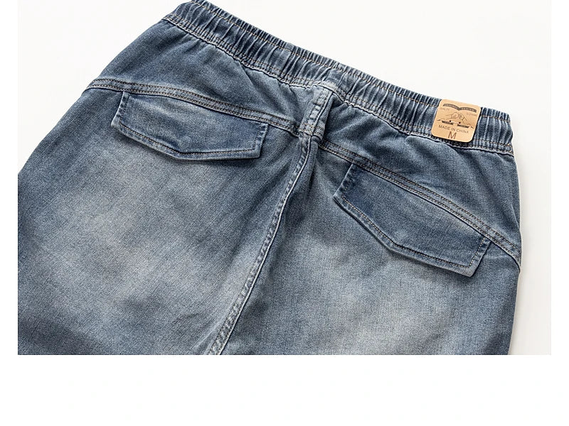 Classic Washed Blue Denim Jeans for Men American Minimalist Loose Tapered Pants Versatile for Outdoor Wear Elastic Waistband