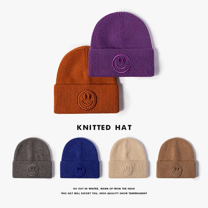 Wool hat female Korean versioncartoonsmiley face embroidered knittedautumn andwintermen'soutdoorwarm thickened brimless cold hat